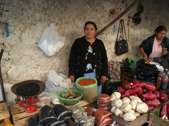 Woman selling vegetables Mexico