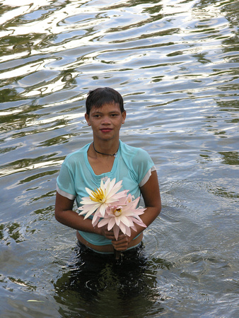Girl with lily in Pond
