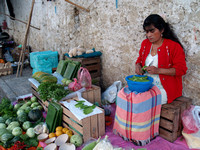 Woman cutting vegetables Mexico