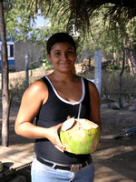 Woman selling a coconut Mexico