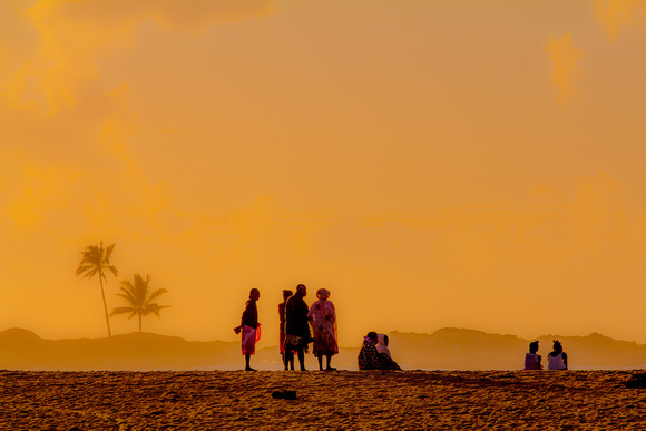 Women at sunrise on Manakara Beach, Madagascar